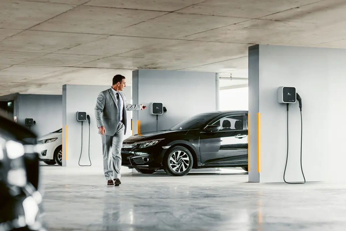 Wall chargers along a residential parking garage
